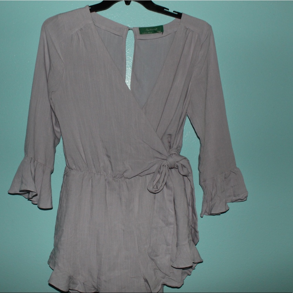 Never worn light purple Lenin romper LARGE